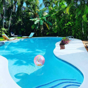 Tropical paradise! Walking distance to the beach!